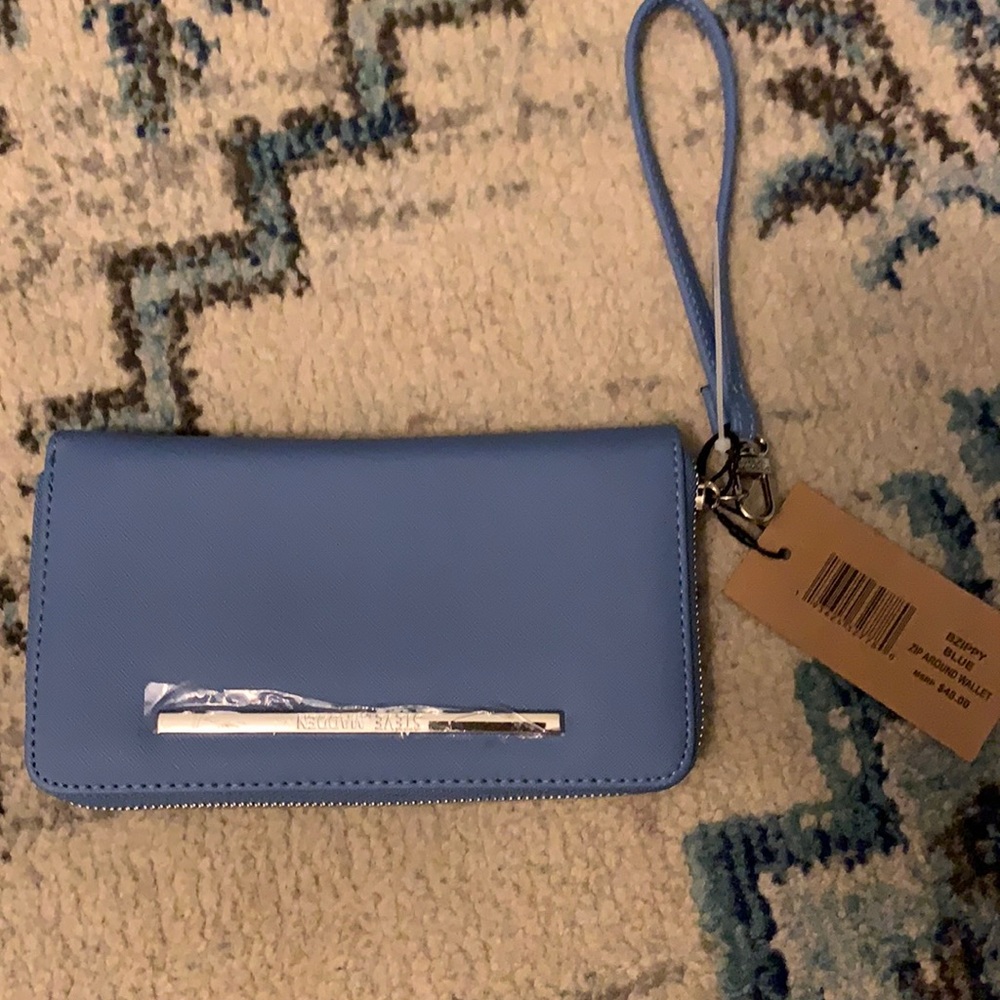 Brand new sky blue Steve Madden wallet.